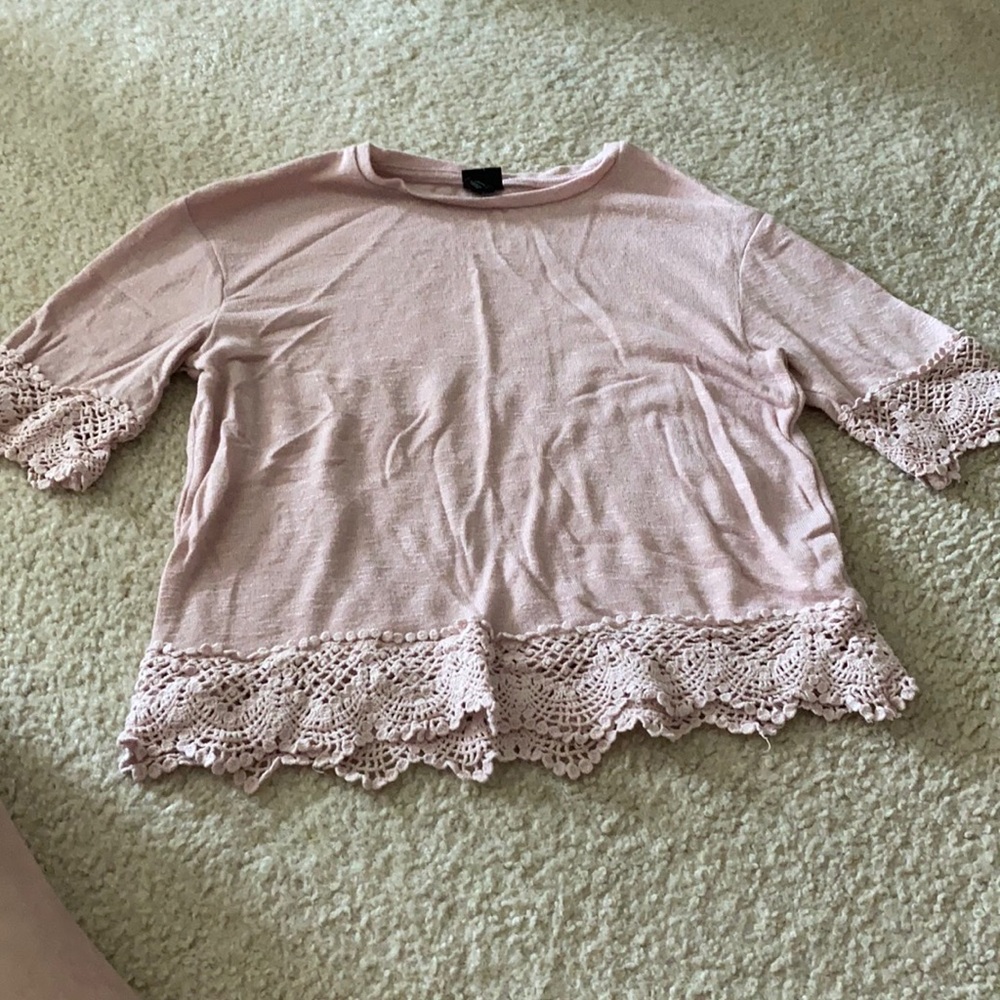 Pink top with nice design.